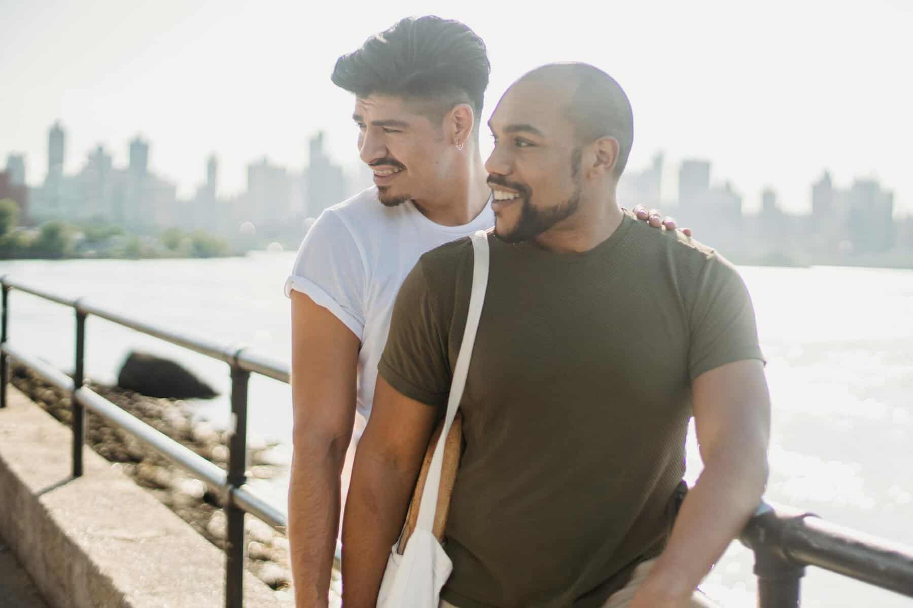Gay couple on a romantic riverside walk — fully customised LGBTQ+ multi-stop trips