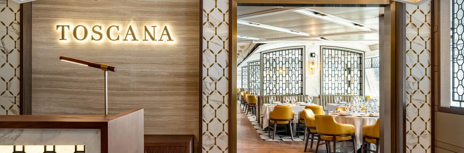Toscana — Italian fine dining, included on every fare