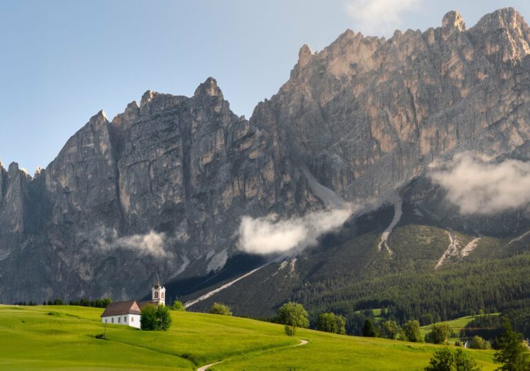 A church below the peaks of the Dolomites