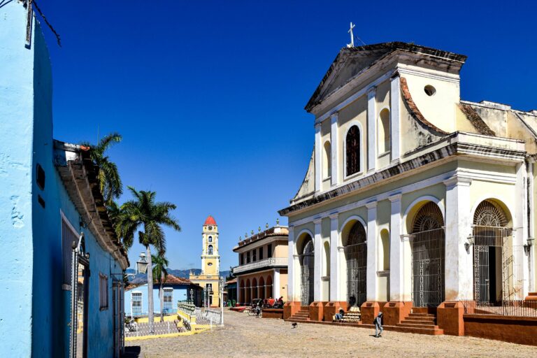 A colourful street and church in Trinidad, Cuba
