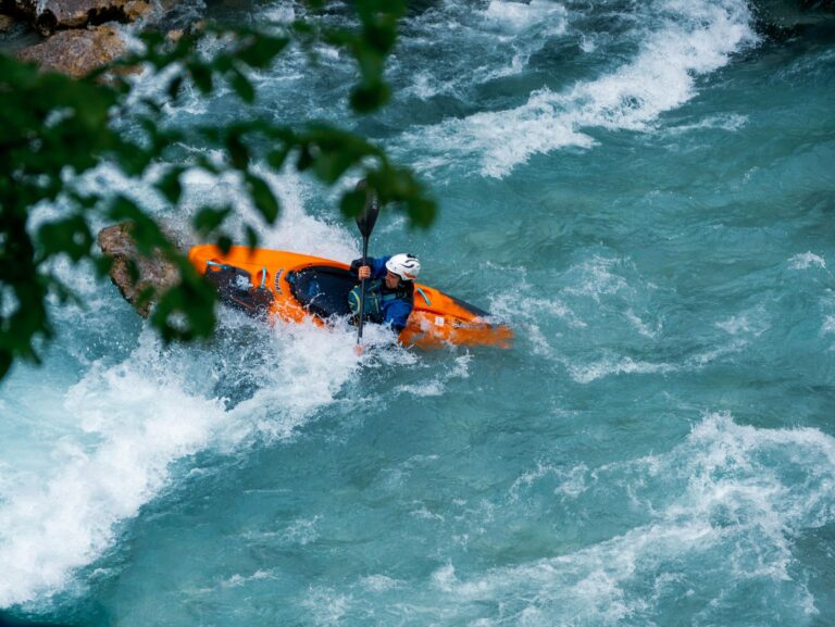 A kayaker on the rapids of the Soča River