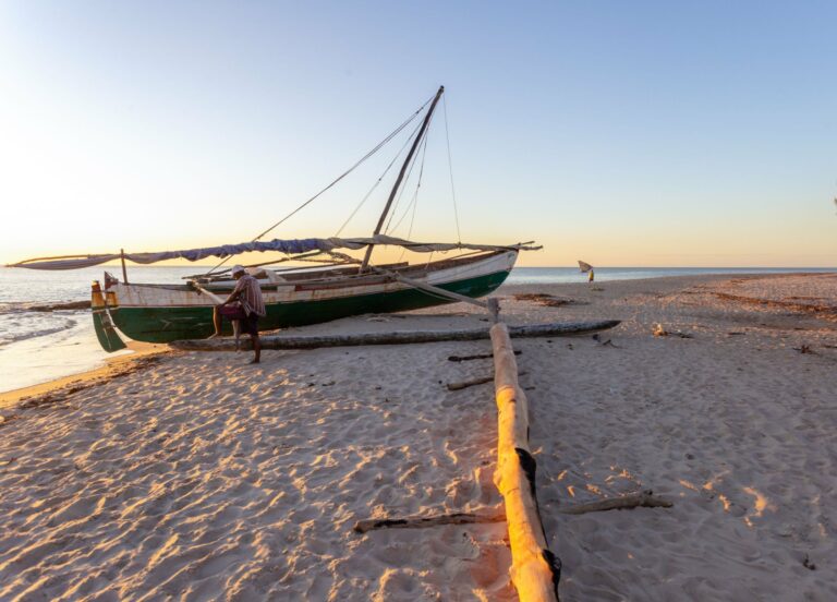 A traditional fishing boat on a Madagascar beach