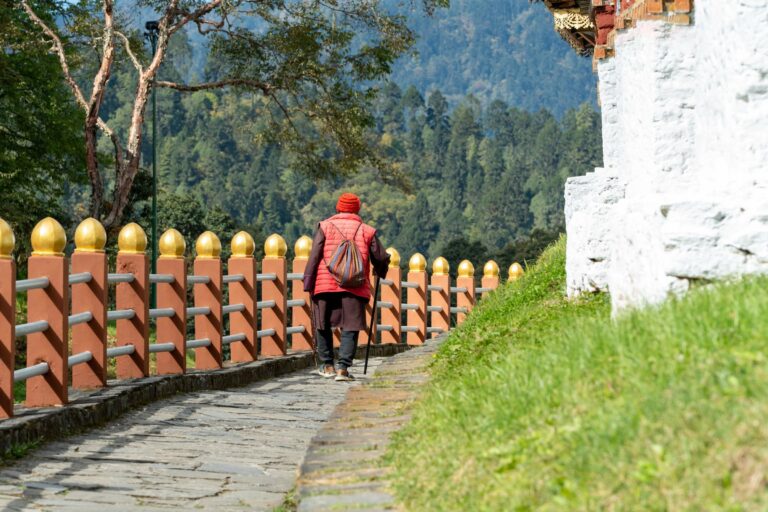 A walker on a temple path in Bhutan