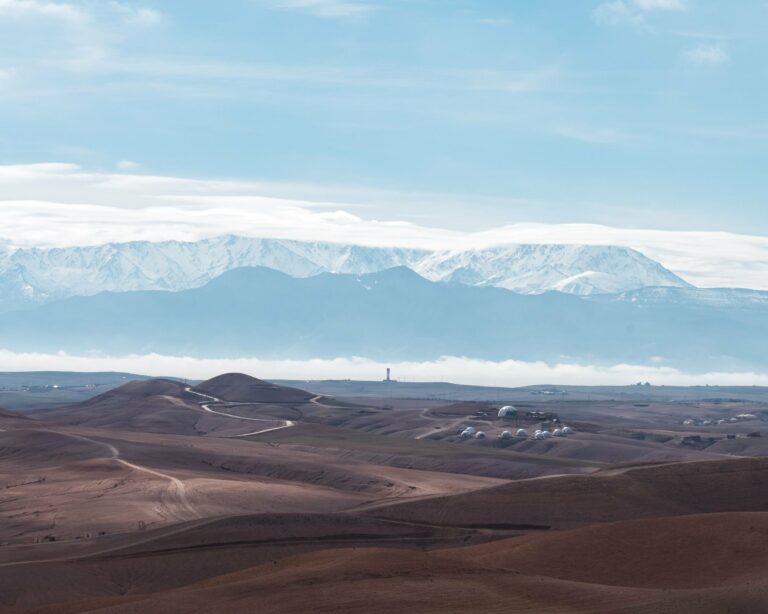 The Agafay desert with the snow-capped Atlas beyond