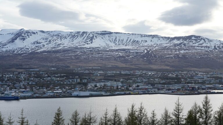 Akureyri below snowcapped mountains