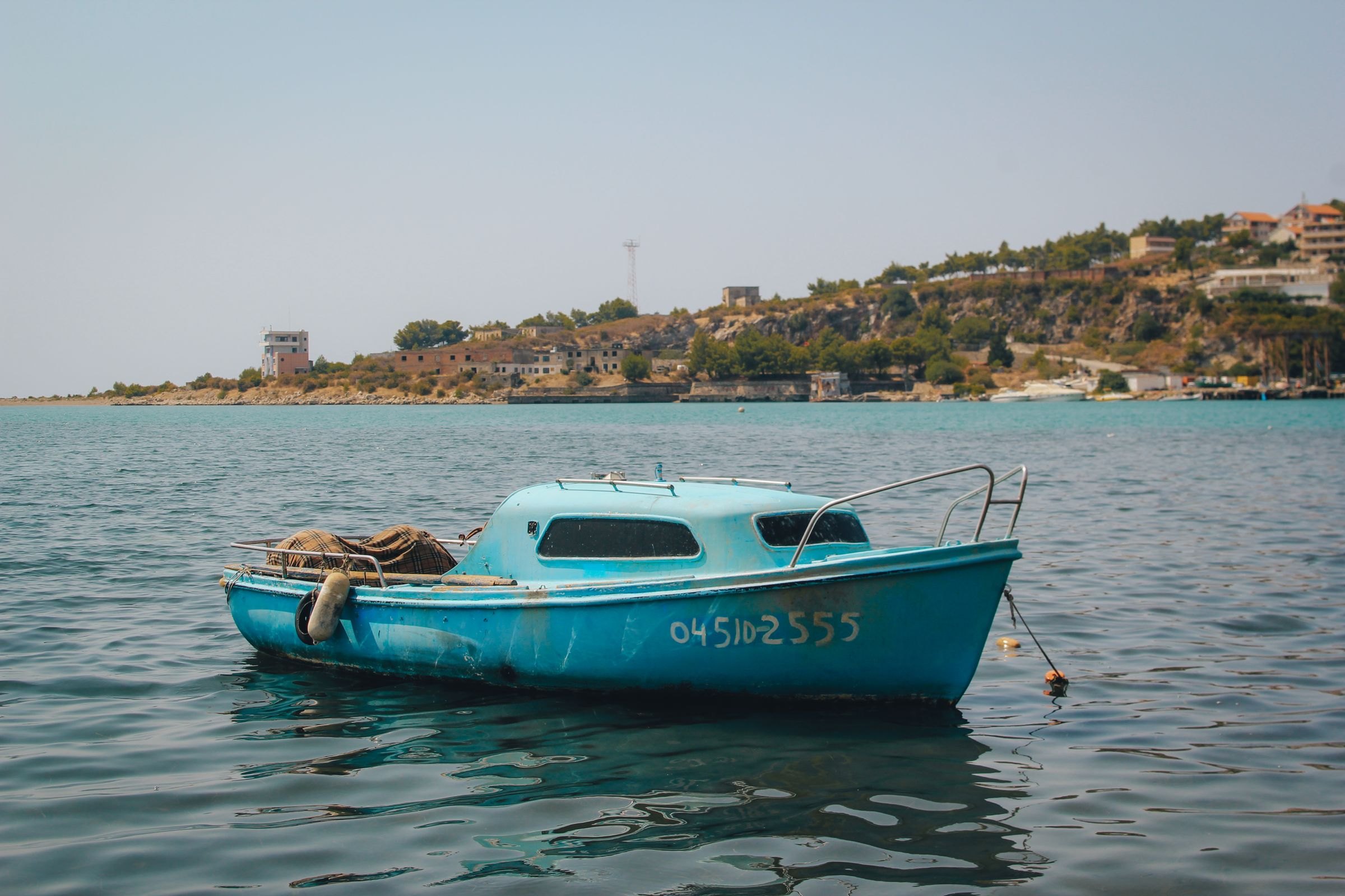 A blue boat on the Albanian coast