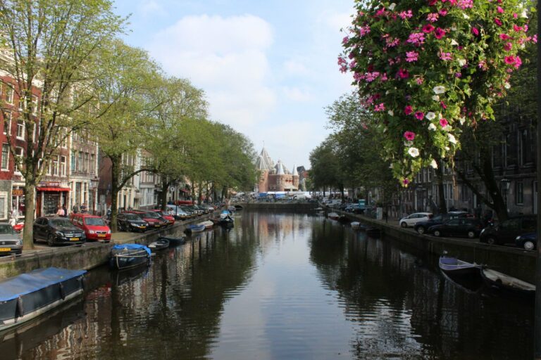 An Amsterdam canal with flowers