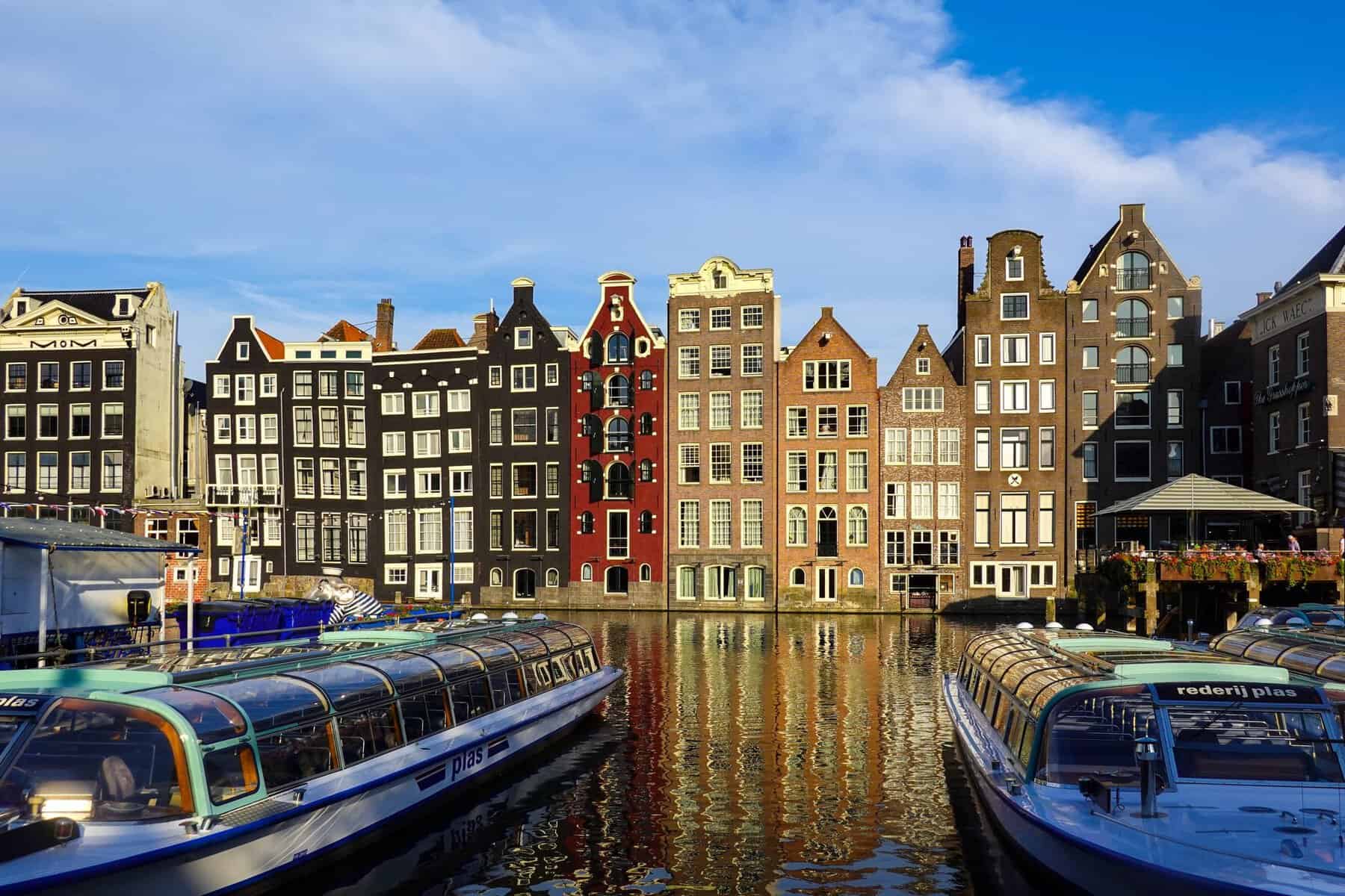 Canal houses and boats in Amsterdam, Netherlands