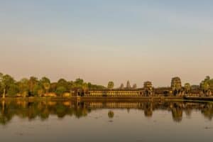Angkor Wat reflected in its pond at sunrise, Cambodia