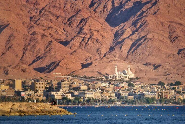 Aqaba below its red mountains