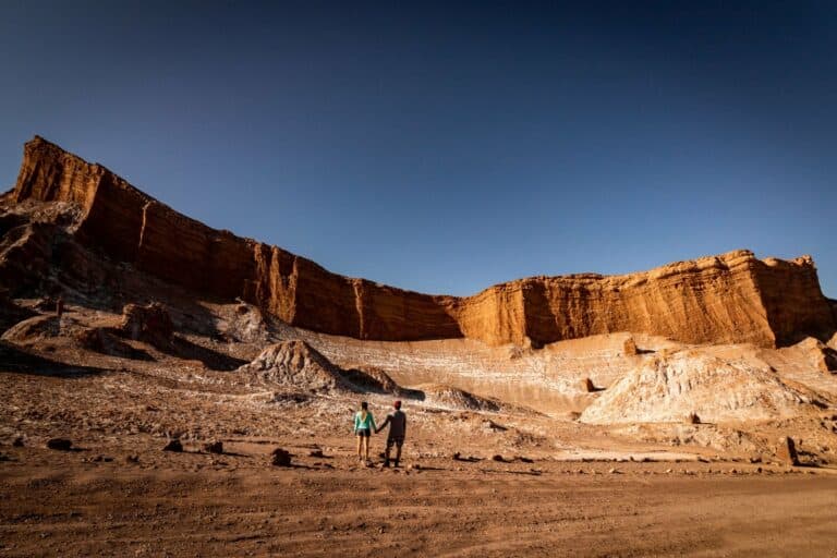 Walkers in a canyon in the Atacama Desert
