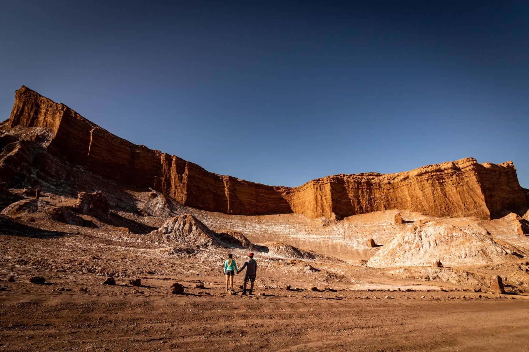 Walkers in a canyon in the Atacama Desert