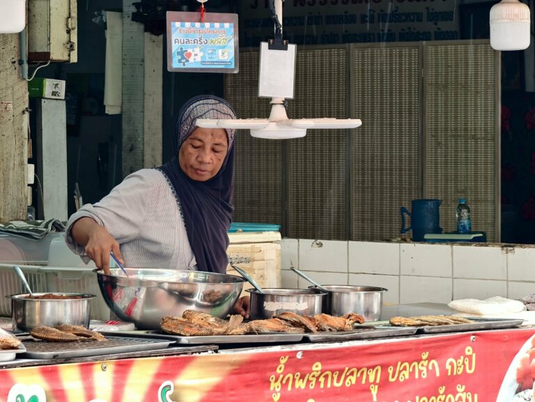 A street food vendor cooking in Bangkok