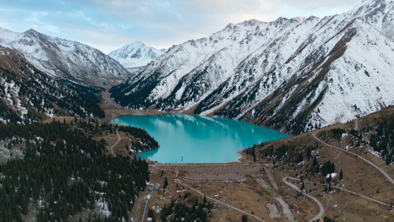 Big Almaty Lake below snow-capped peaks