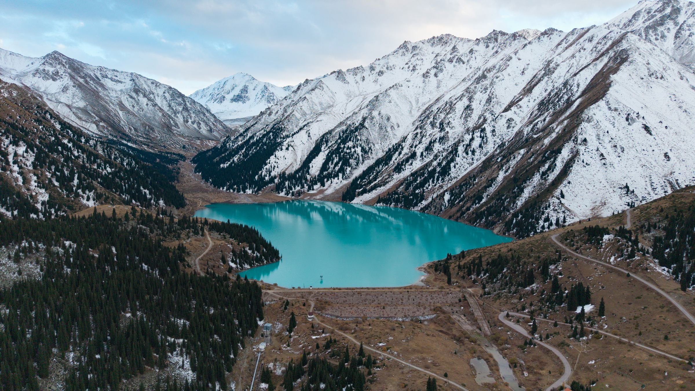 Big Almaty Lake below snow-capped peaks
