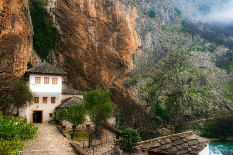 Blagaj Tekke beneath the cliffs at the source of the Buna River, Bosnia and Herzegovina