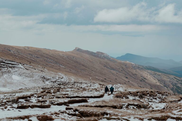 Hikers on a mountain trail in Romania
