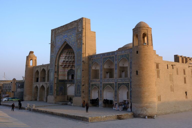A historic mosque in Bukhara at sunset