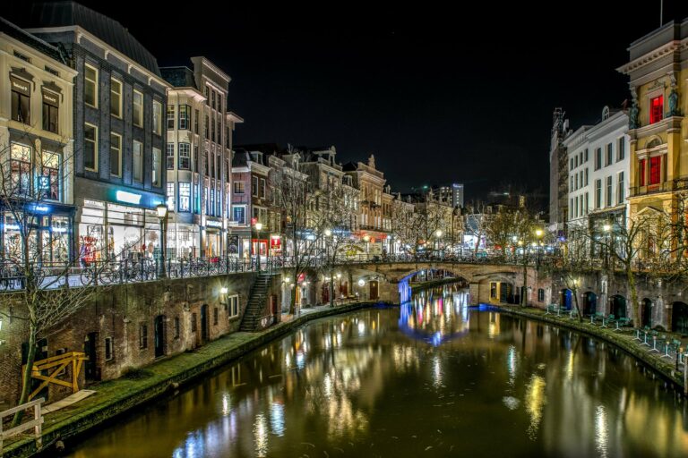 A canal lit up at night