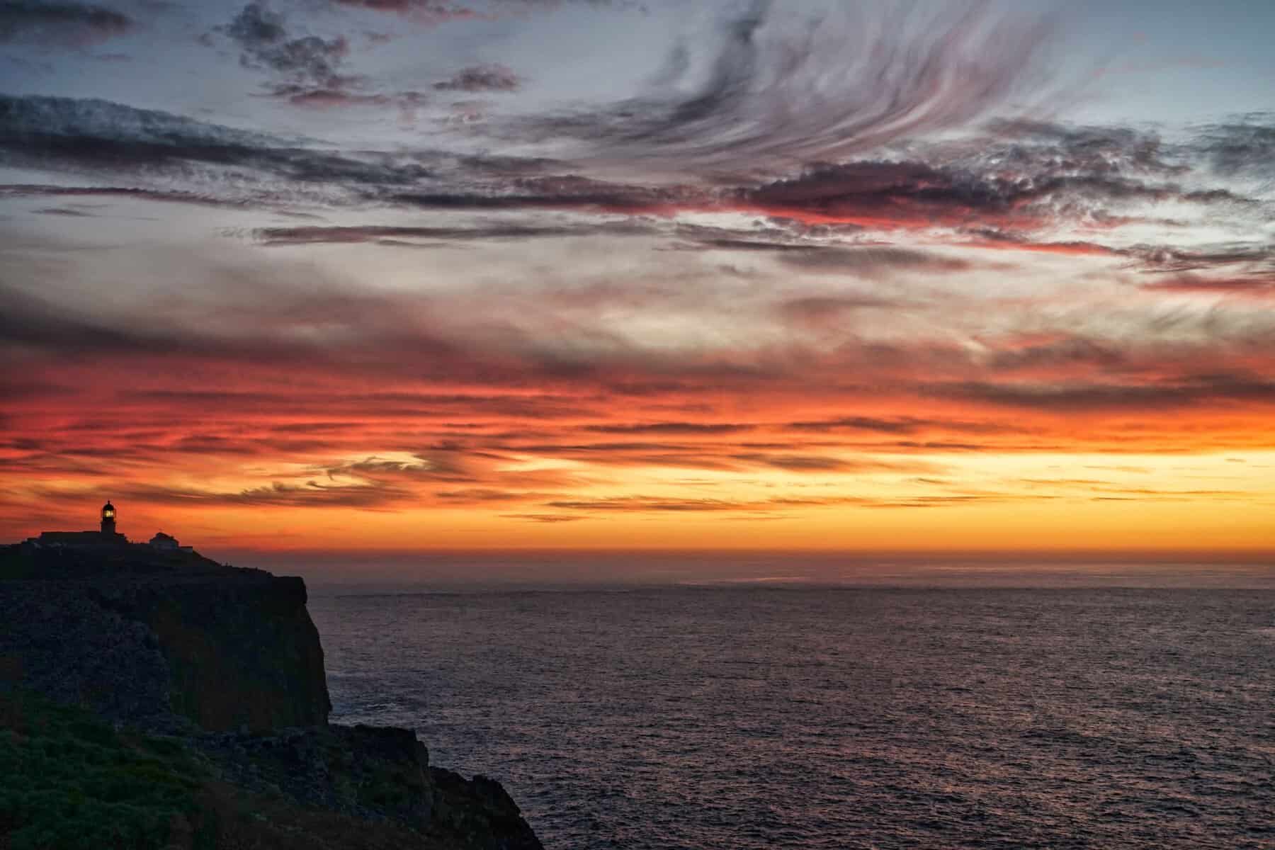 Sunset over the cliffs of Cape St Vincent near Sagres, Portugal