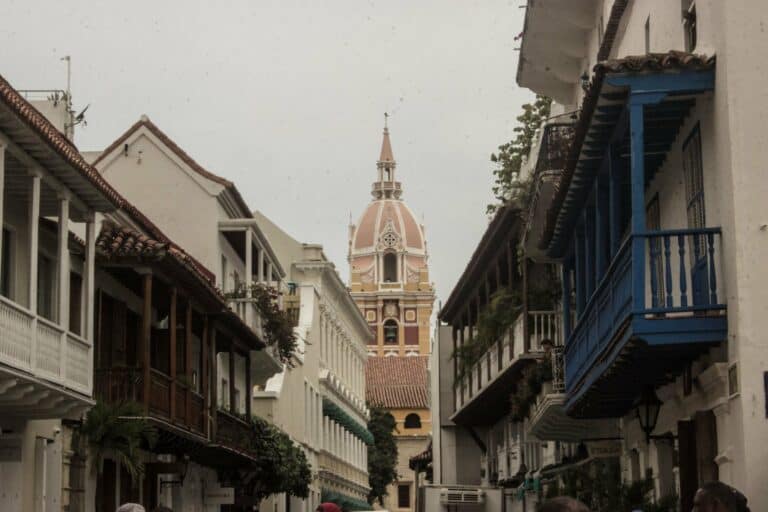 A colonial street and cathedral tower in Cartagena, Colombia