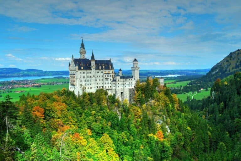 Neuschwanstein Castle among autumn forests in Bavaria