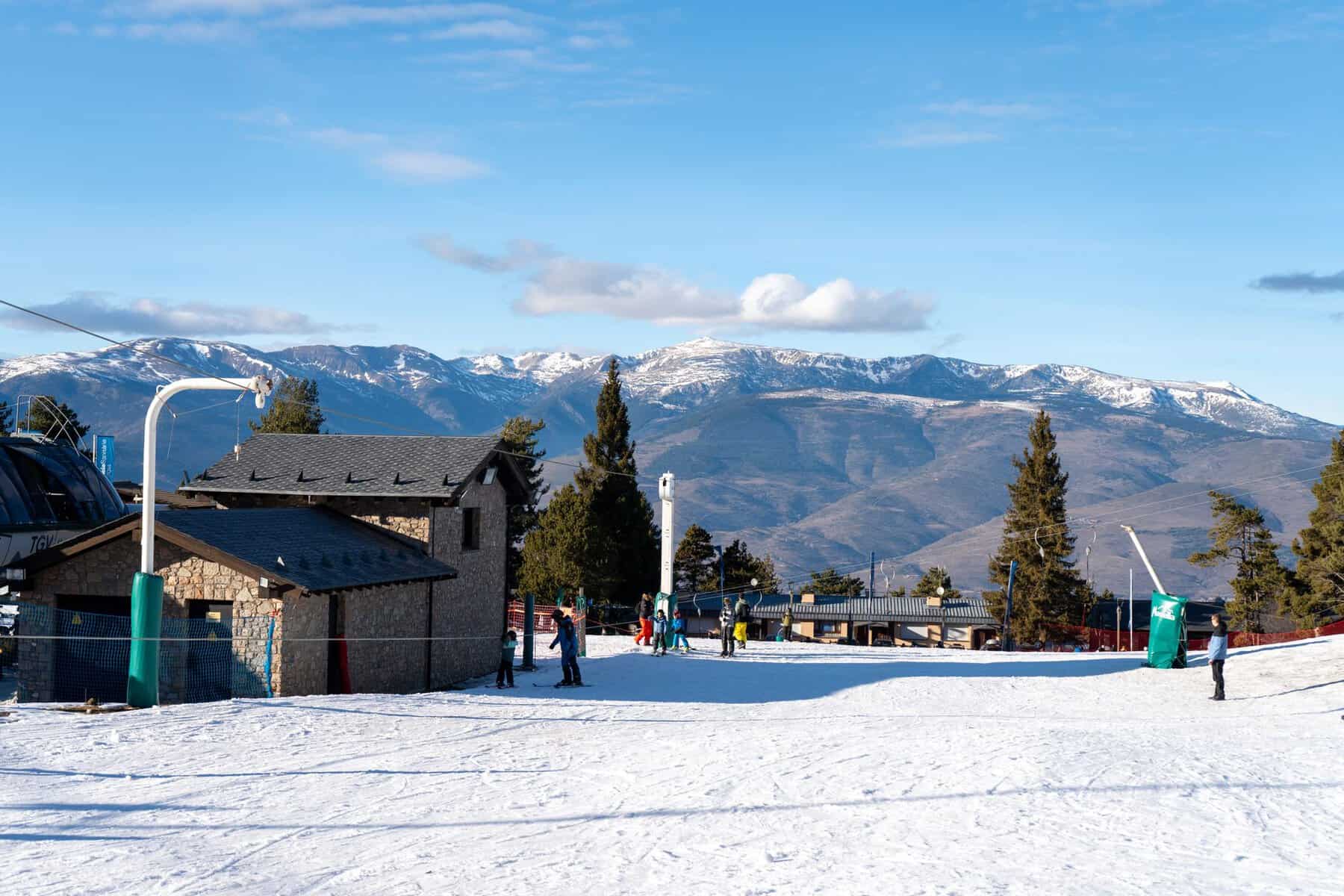 Snow-covered slopes on a sunny day at Masella ski resort in the Cerdanya