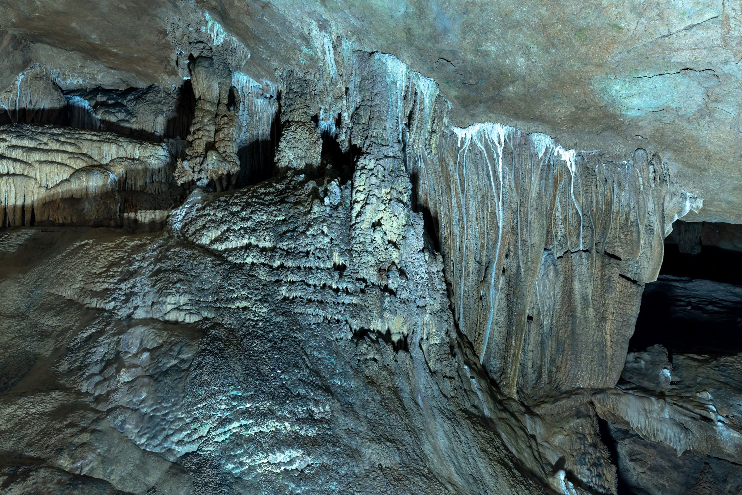 Stalactites and stalagmites inside a cave