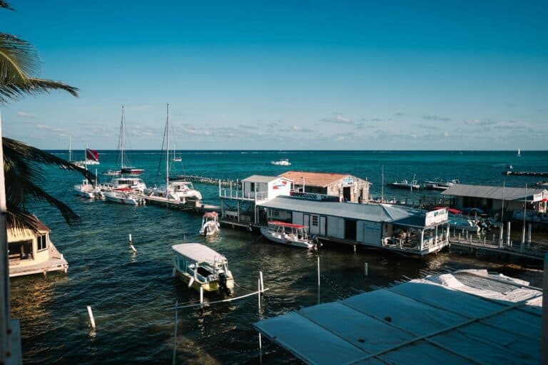 Boats and jetties on the clear water of Caye Caulker, Belize