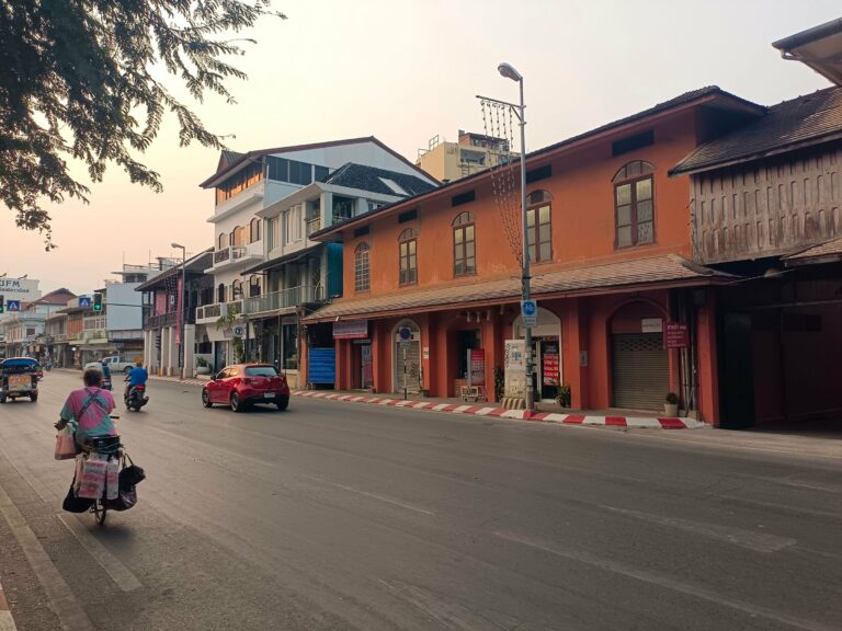 A cyclist on a street in Chiang Mai