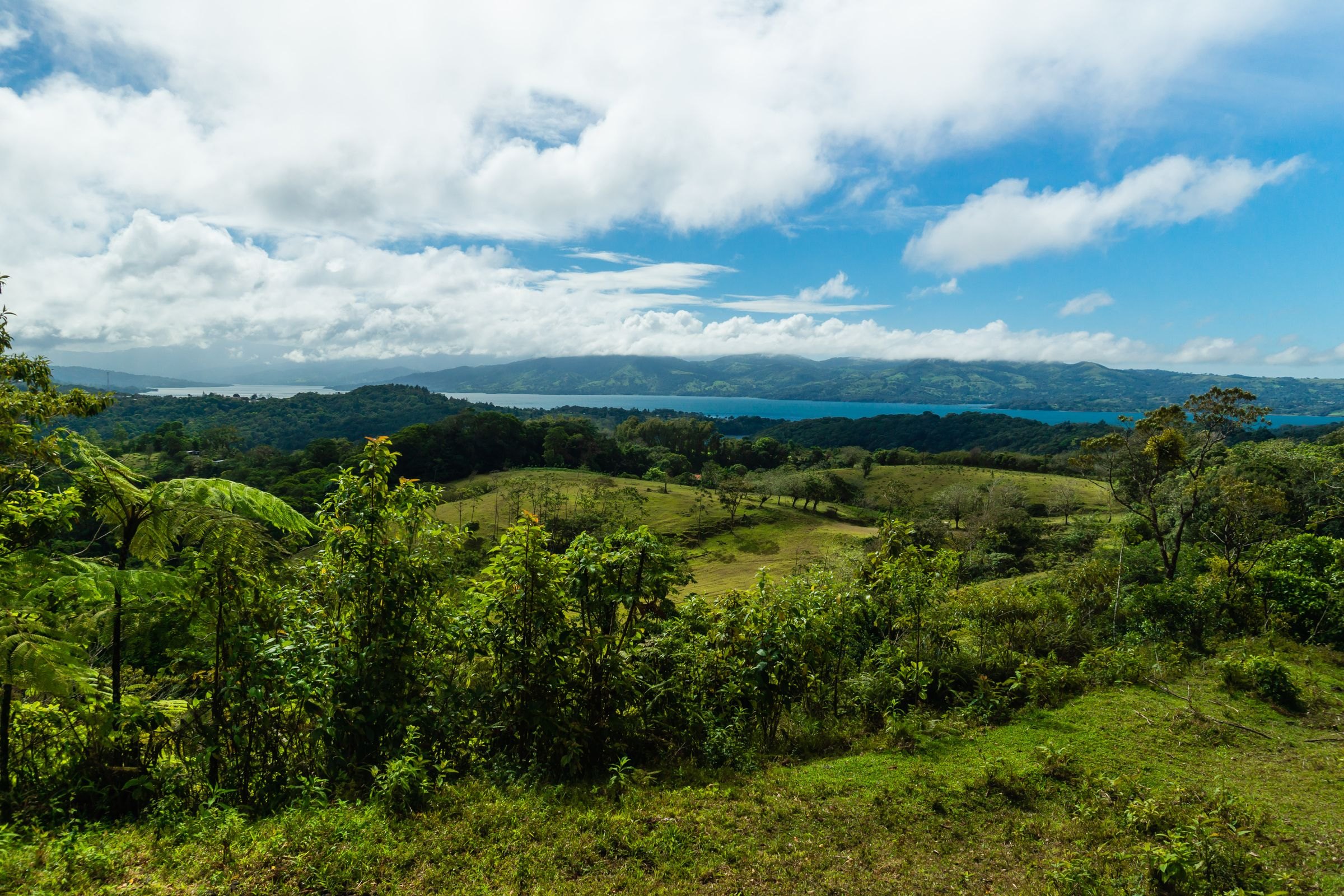 Green hills and a lake in Costa Rica