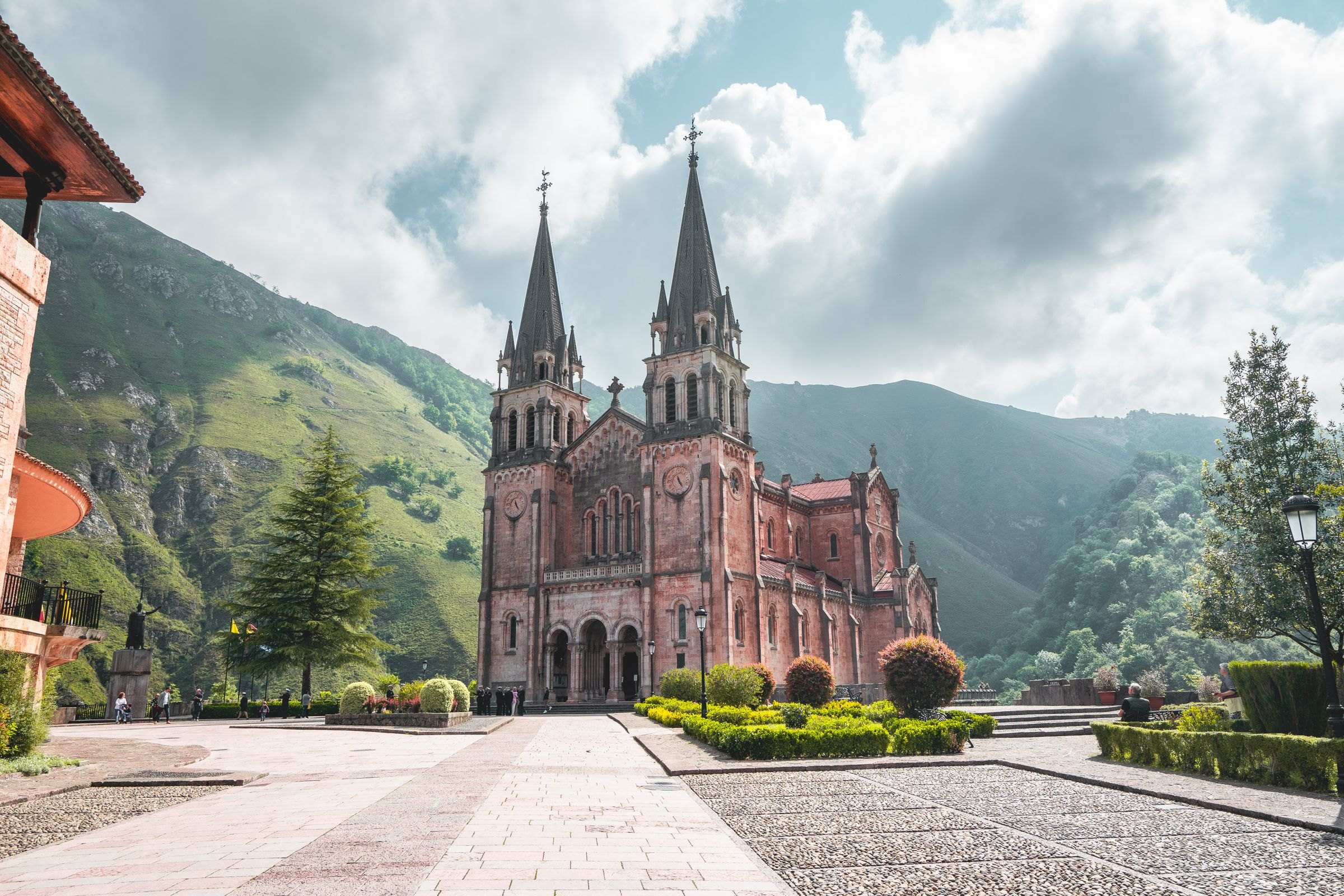The Basilica of Covadonga among green mountains