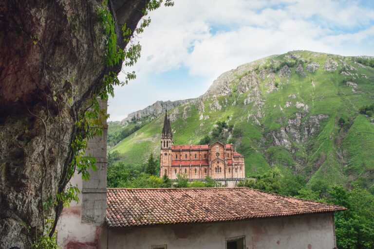 The church of Covadonga in a green valley