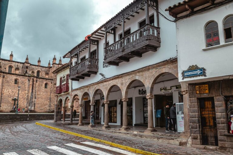 Colonial balconies on a street in Cusco