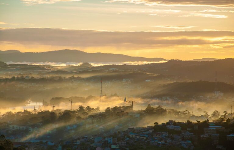 Sunrise over the misty hills of Dalat