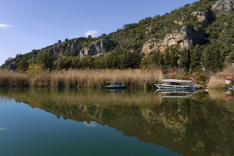 Rock tombs reflected in the Dalyan River