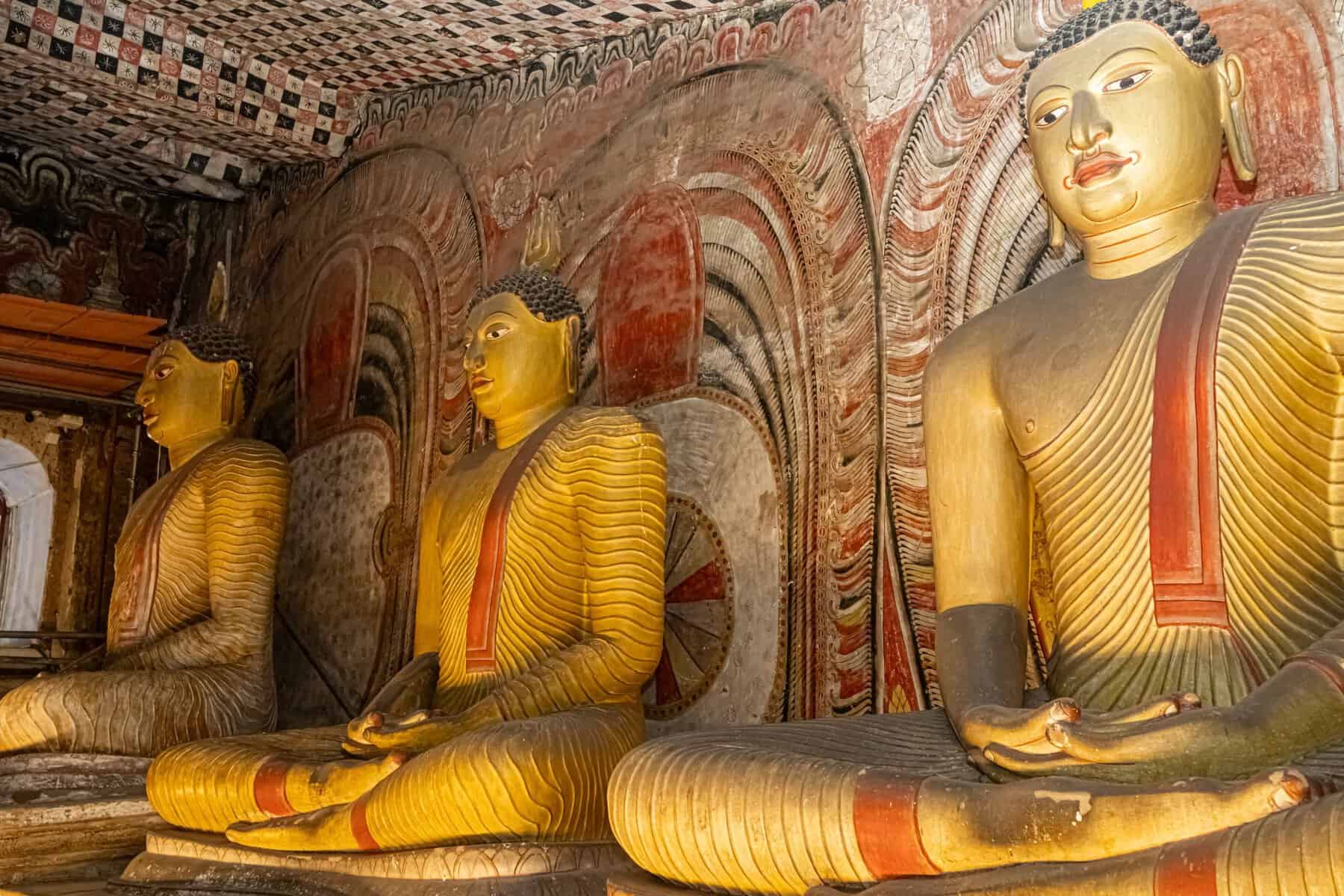 Buddha statues inside the Dambulla cave temples, Sri Lanka