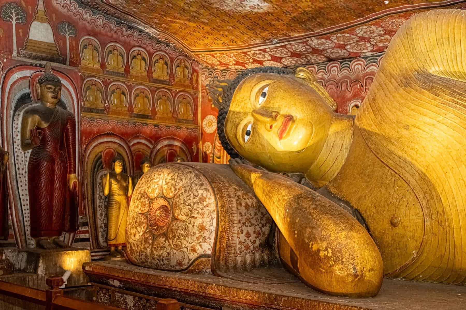 Buddha statues inside the Dambulla cave temple, Sri Lanka
