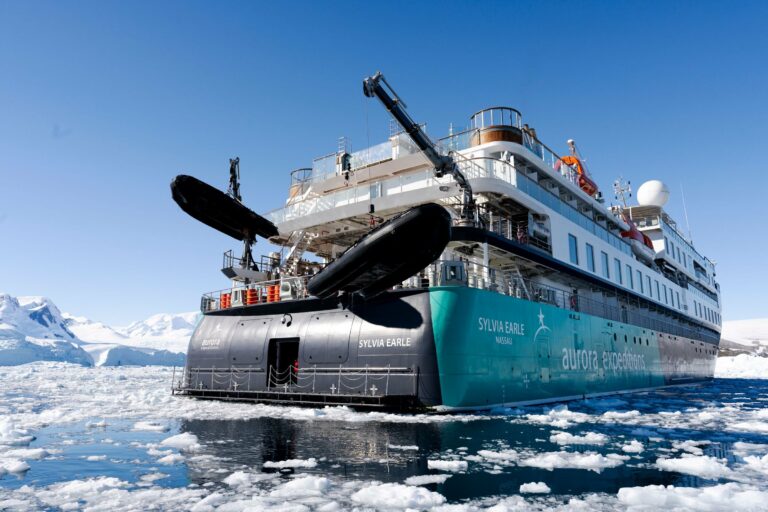 An expedition ship in icy Arctic waters