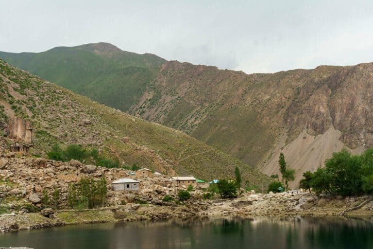 A mountain lake and village in the Fann Mountains, Tajikistan