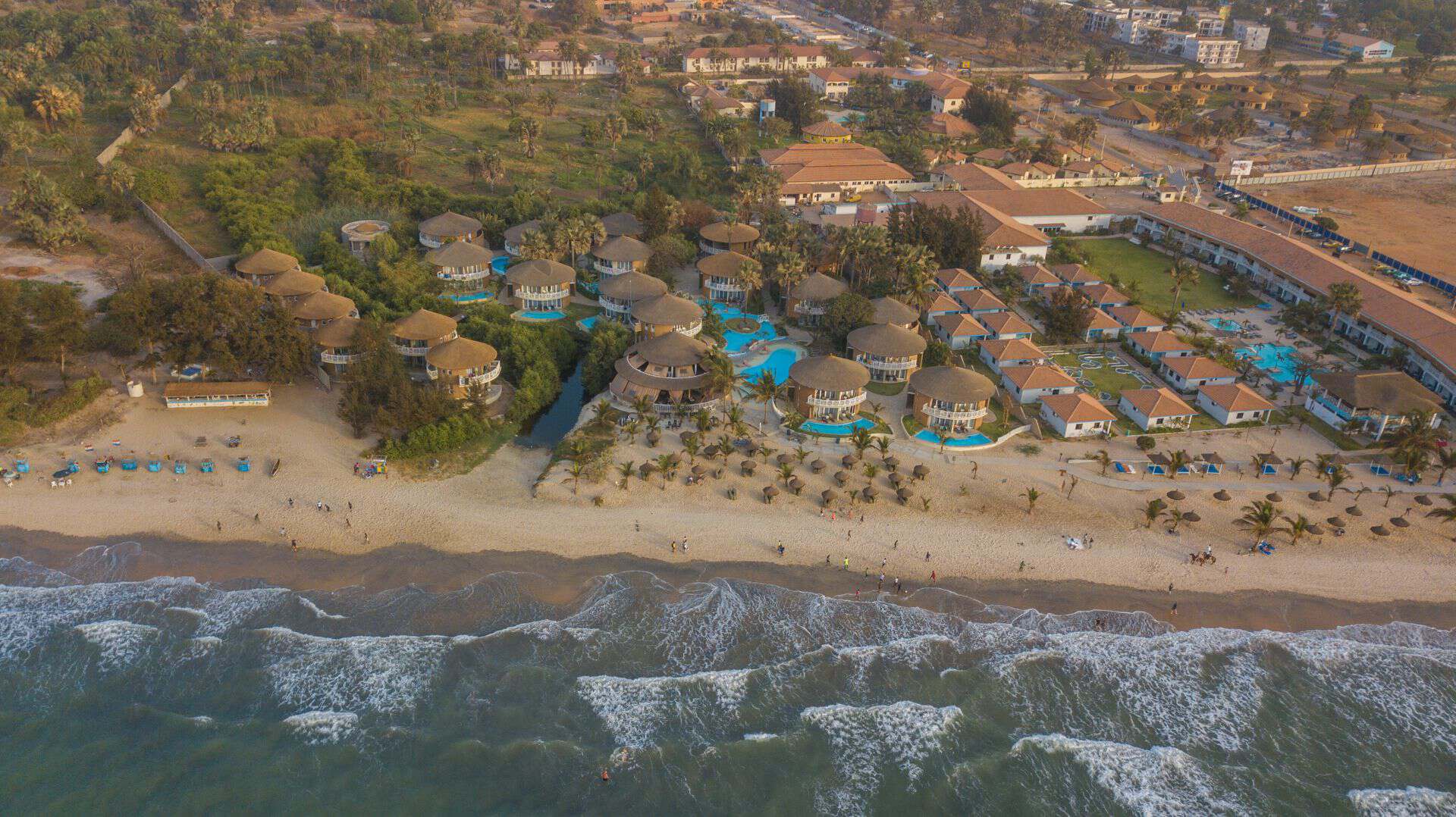 Aerial view of a beachfront resort on the coast of The Gambia