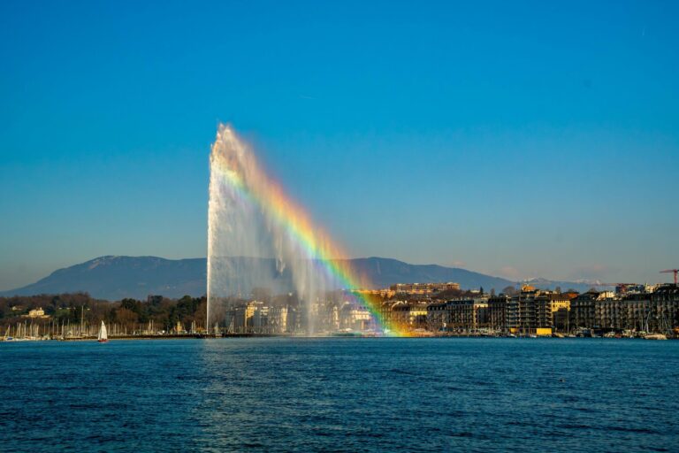 The Jet d'Eau on Lake Geneva with a rainbow