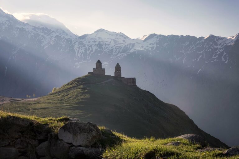 Gergeti Trinity Church in soft light below the Caucasus
