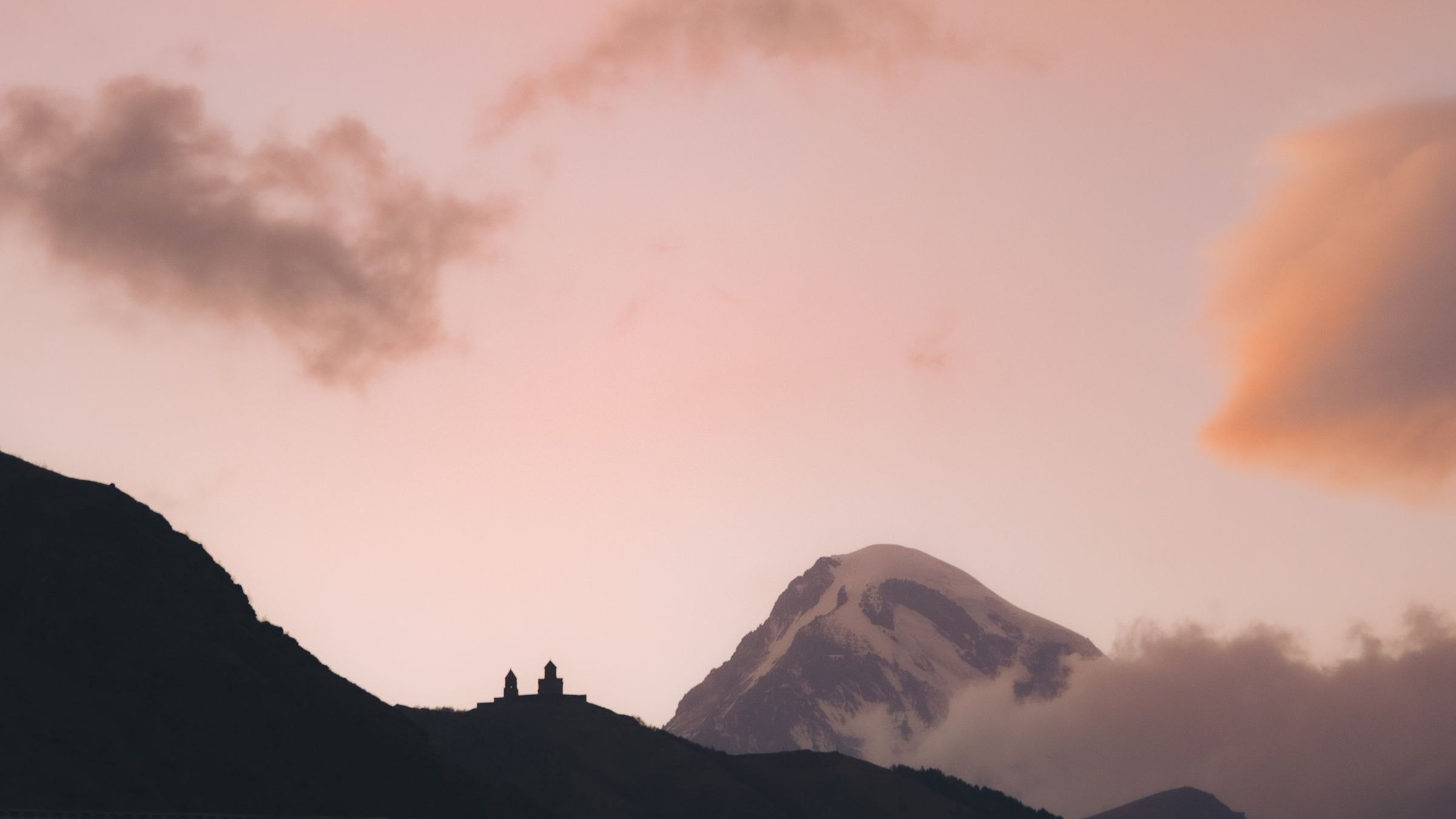 Gergeti Trinity Church and Mount Kazbek at sunset