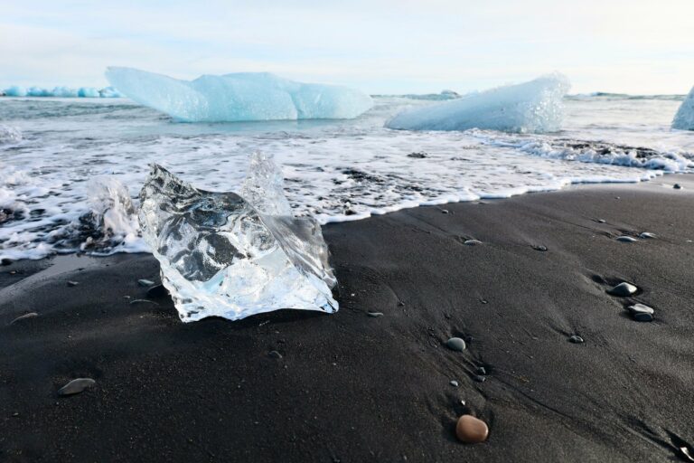 Glacier ice on the black sand of Diamond Beach
