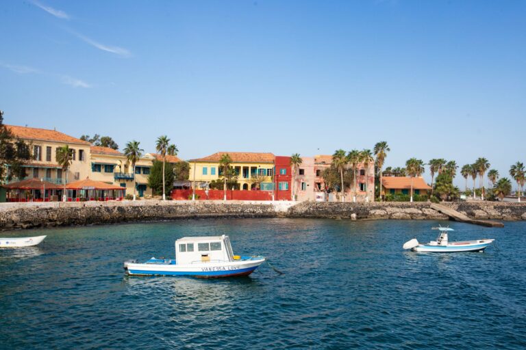 Colourful colonial buildings and boats on Gorée Island