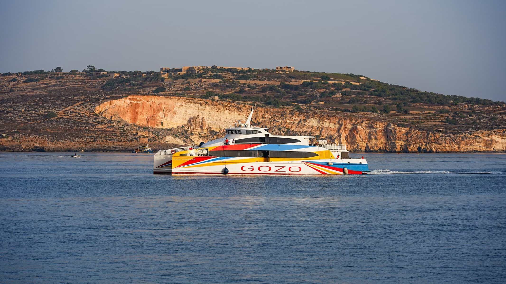 The Gozo ferry passing the cliffs of Malta