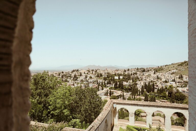 Granada seen through the arches of the Alhambra