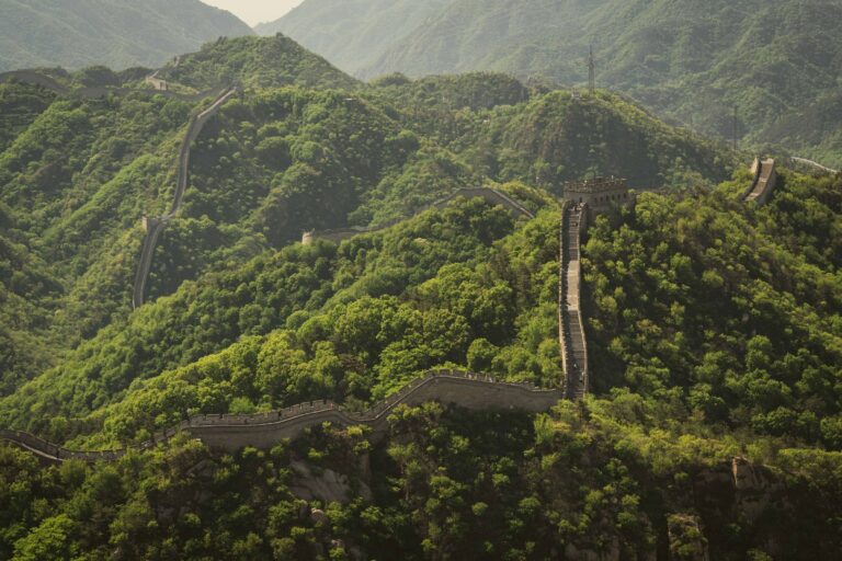 The Great Wall winding over green hills