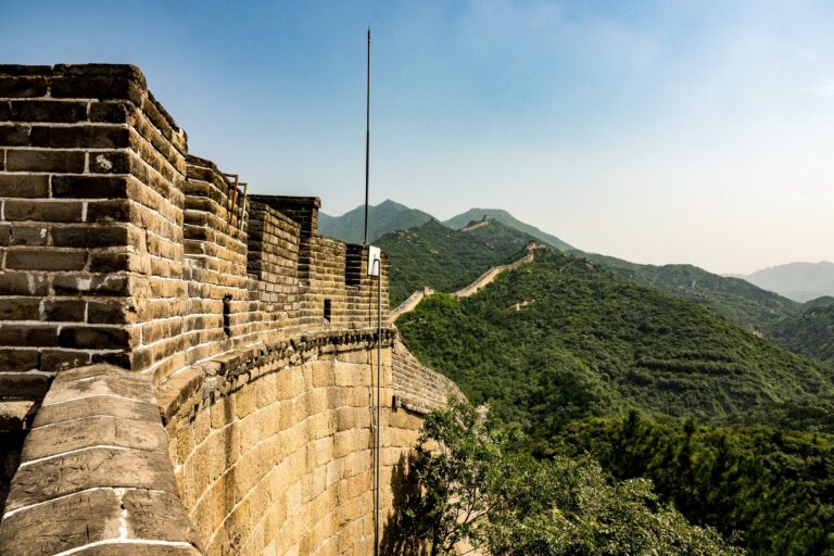 The Great Wall winding through green hills